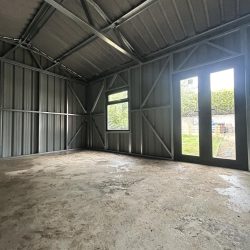 inside of large galvanised shed by MD Garden Sheds2GO